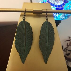 Boho turquoise colored feather earrings